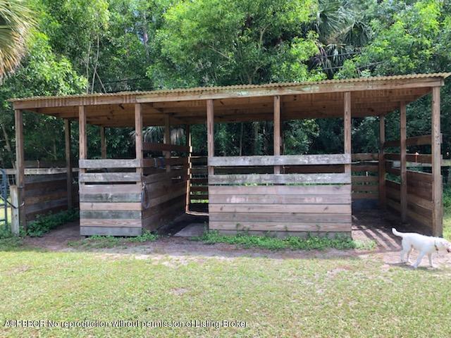 2762 F Road Loxahatchee, FL 33470 - Photo 19 of 25 a view of a backyard