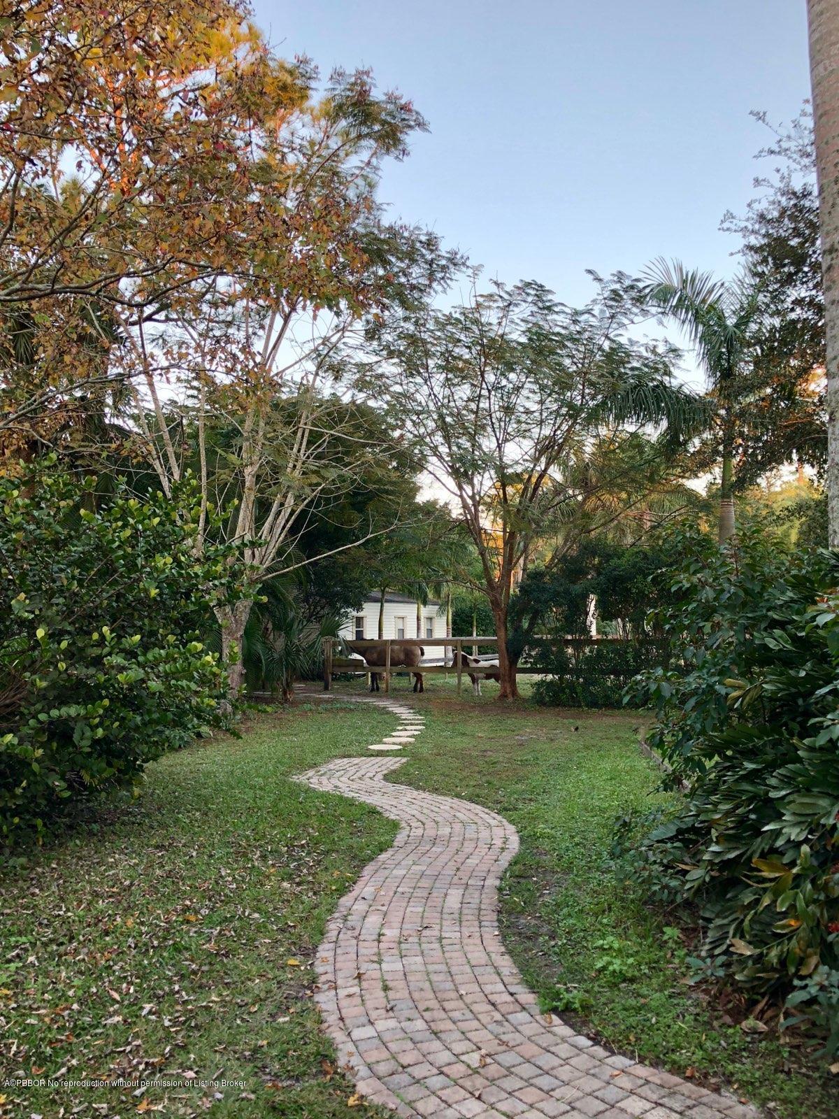 2762 F Road Loxahatchee, FL 33470 - Photo 21 of 25 a view of a park with large trees