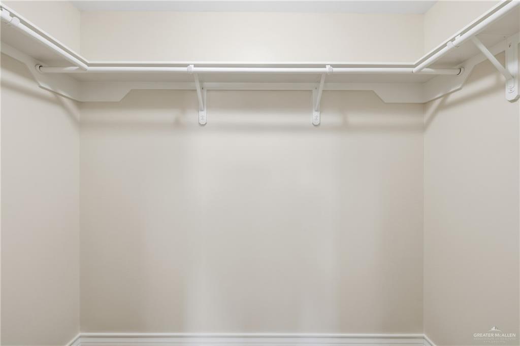 709 Alexandra Avenue Mercedes, TX 78570 - Photo 12 of 16 a view of walk in closet with empty racks