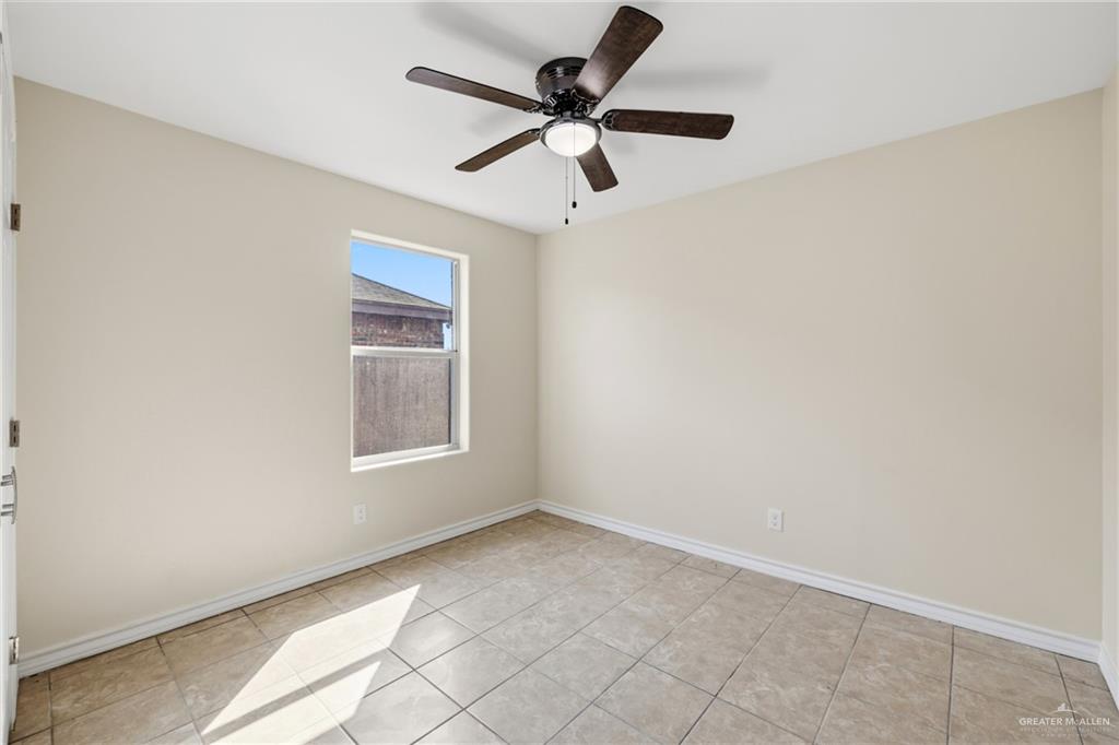 709 Alexandra Avenue Mercedes, TX 78570 - Photo 10 of 16 a view of an empty room with a window