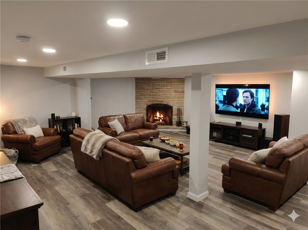 97 Crimson Bramble Road Henrietta, NY 14623 - Photo 23 of 31 virtually staged family room in finished basement