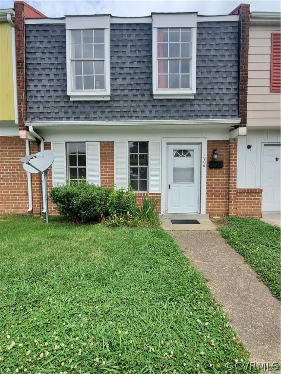 1906 Beaver Road Henrico, VA 23075 - Photo 1 of 13 a front view of a house with garden