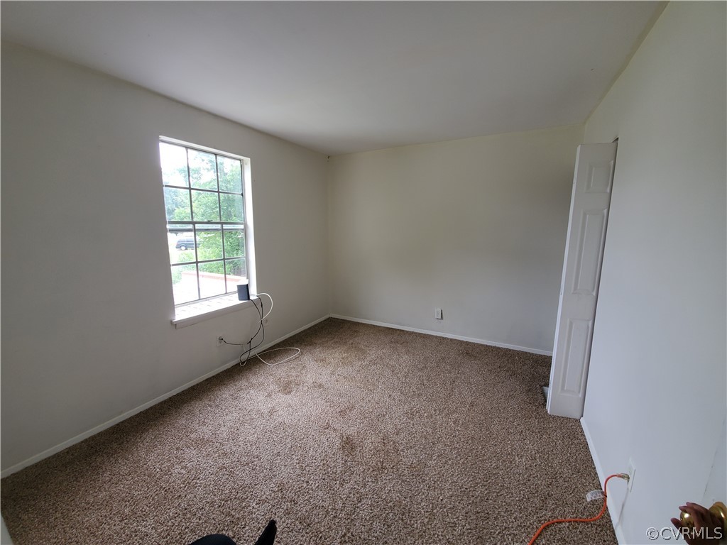 1906 Beaver Road Henrico, VA 23075 - Photo 7 of 13 an empty room with a window