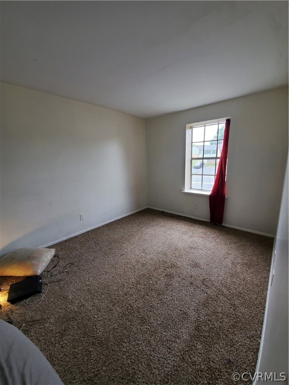 1906 Beaver Road Henrico, VA 23075 - Photo 9 of 13 an empty room with windows