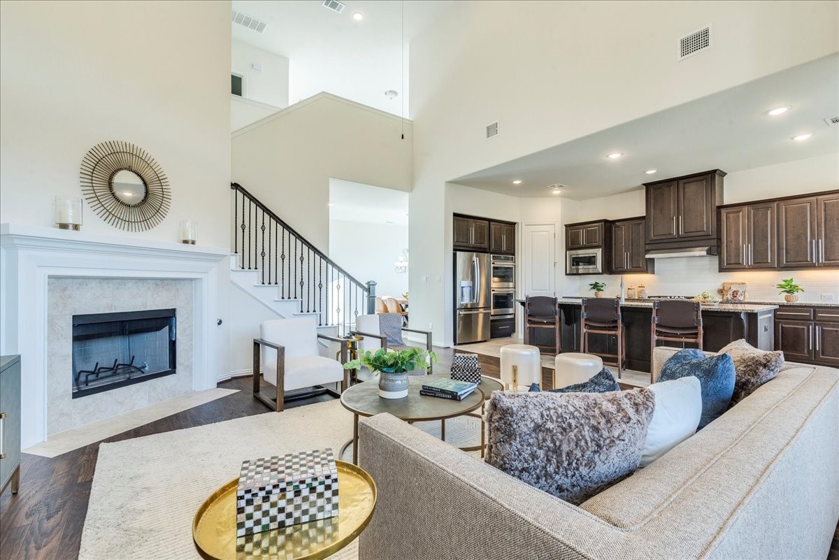 1689 Cool Spring Way Austin, TX 78737 - Photo 40 of 40 Living room opening up to the kitchen. showcasing the open floorplan.