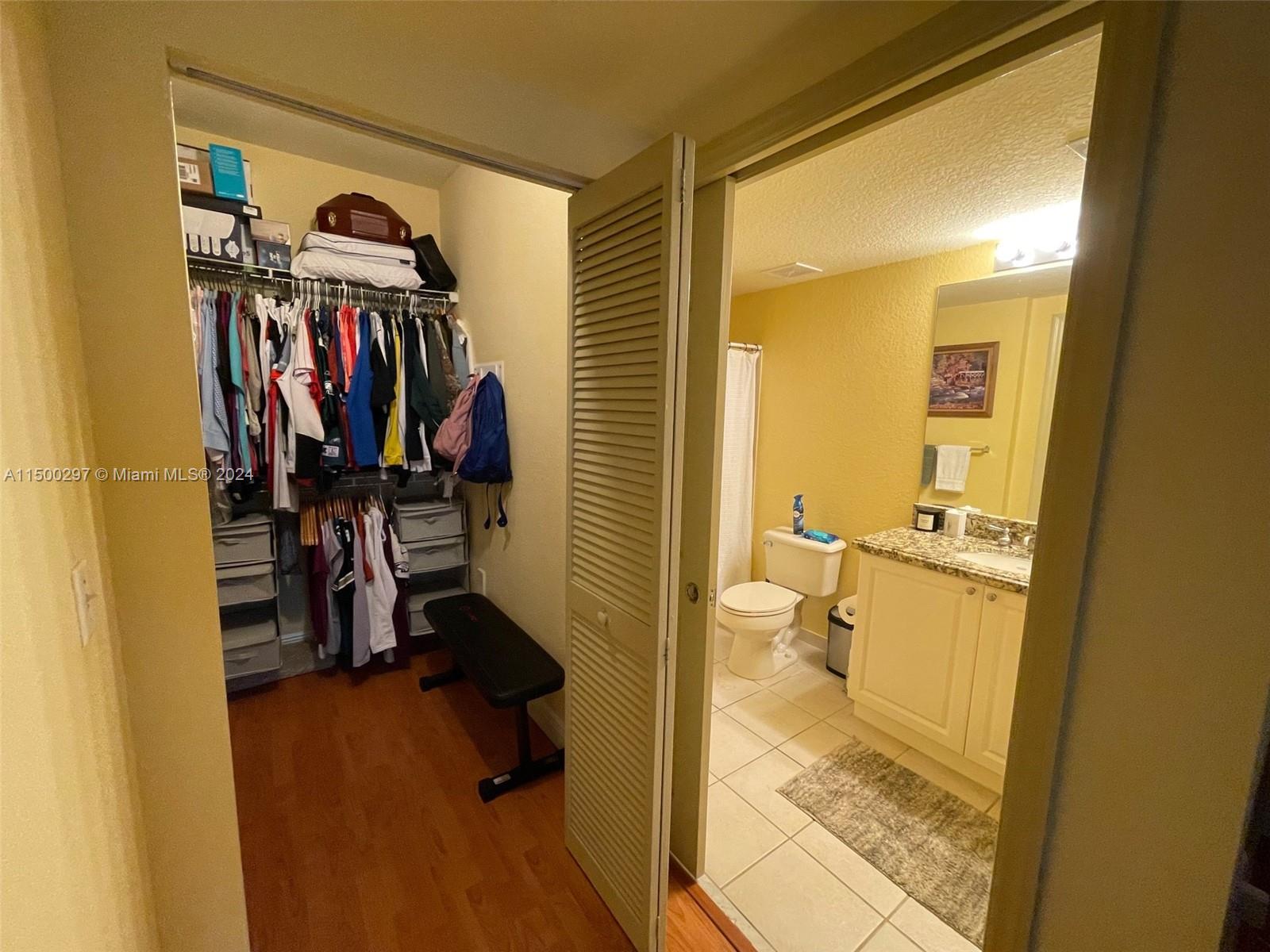 6830 West Sample Road, Unit 6830 Coral Springs, FL 33067 - Photo 14 of 30 a view of a livingroom with the furniture and closet