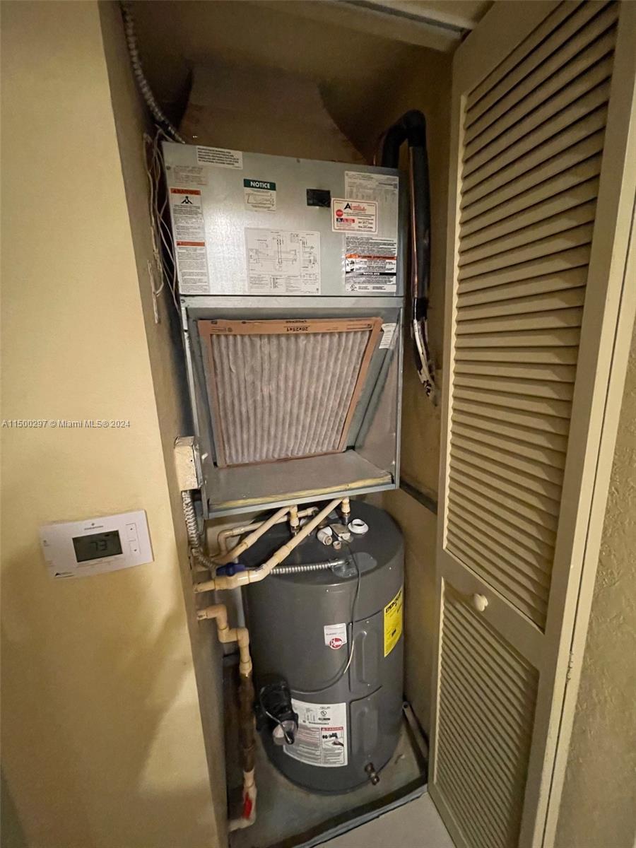 6830 West Sample Road, Unit 6830 Coral Springs, FL 33067 - Photo 22 of 30 a view of washer and dryer