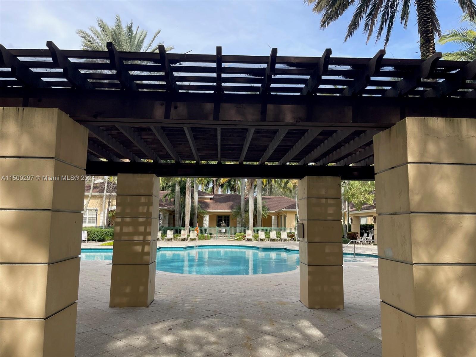 6830 West Sample Road, Unit 6830 Coral Springs, FL 33067 - Photo 24 of 30 a view of a garage