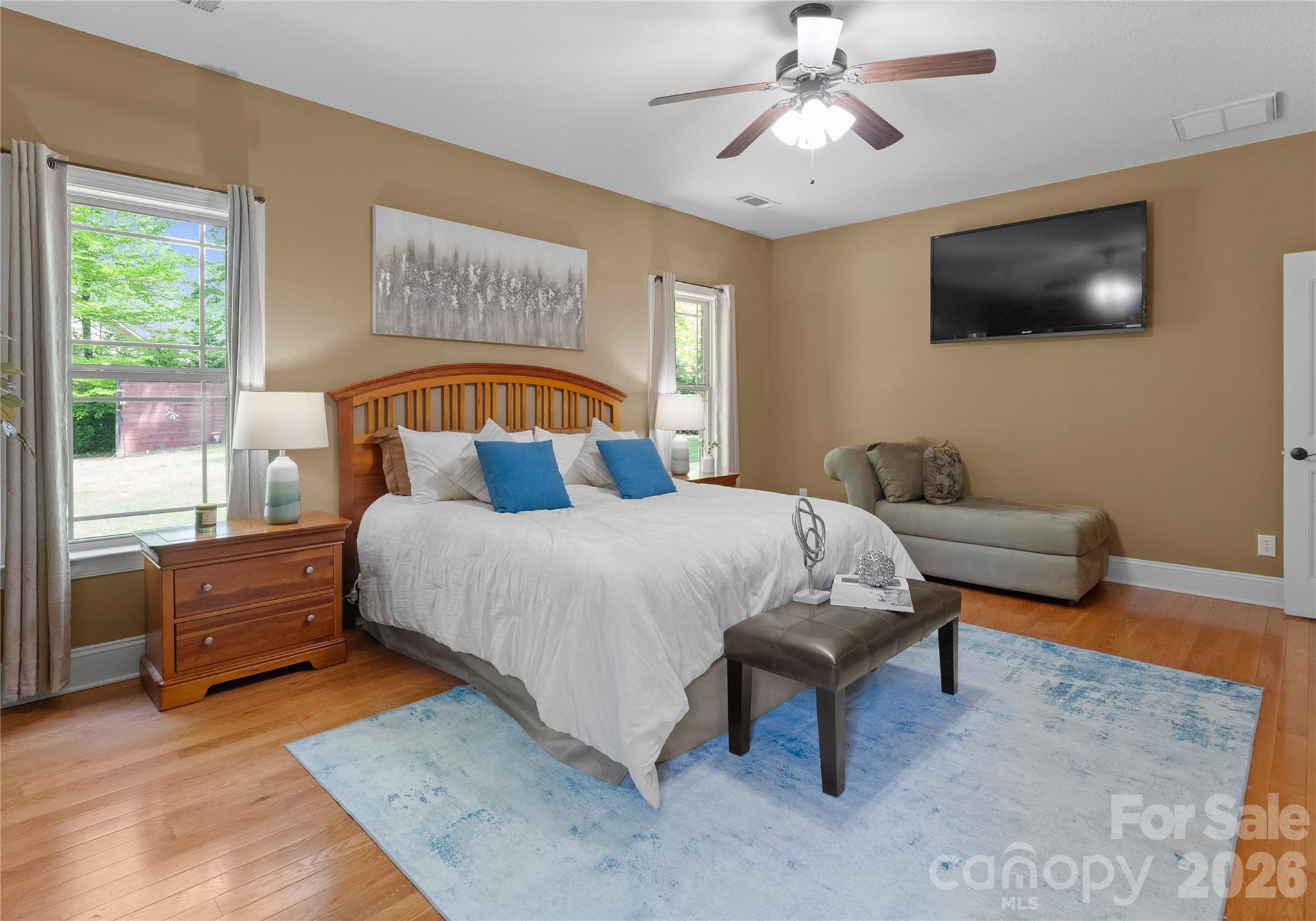 860 Arrow Point Lane Kannapolis, NC 28081 - Photo 19 of 38 a bedroom with a bed and a flat screen tv