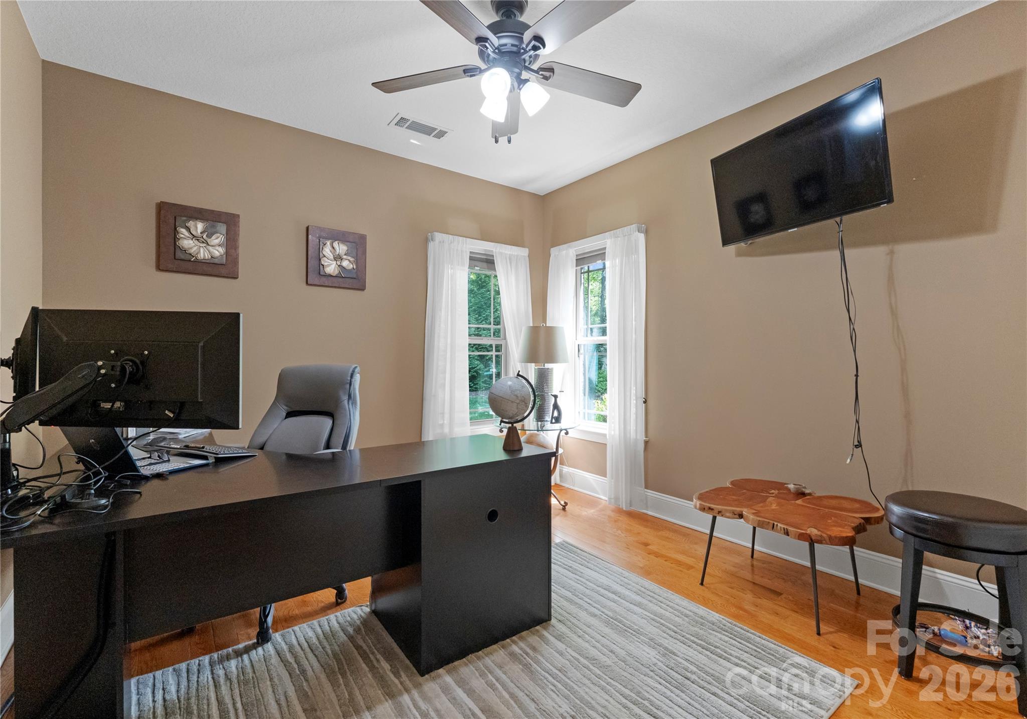 860 Arrow Point Lane Kannapolis, NC 28081 - Photo 25 of 38 a living room with furniture and a flat screen tv