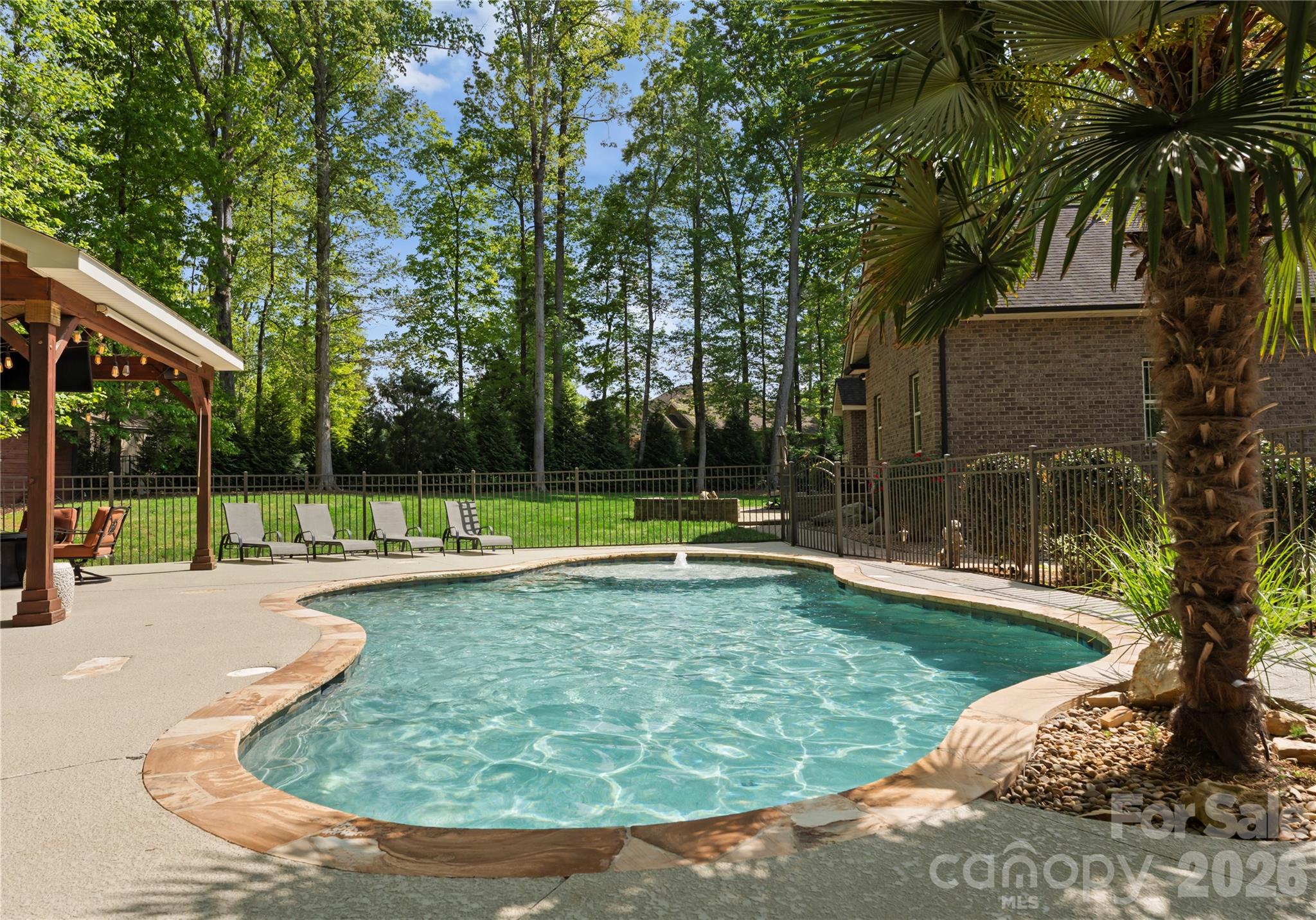 860 Arrow Point Lane Kannapolis, NC 28081 - Photo 28 of 38 a view of a backyard with swimming pool