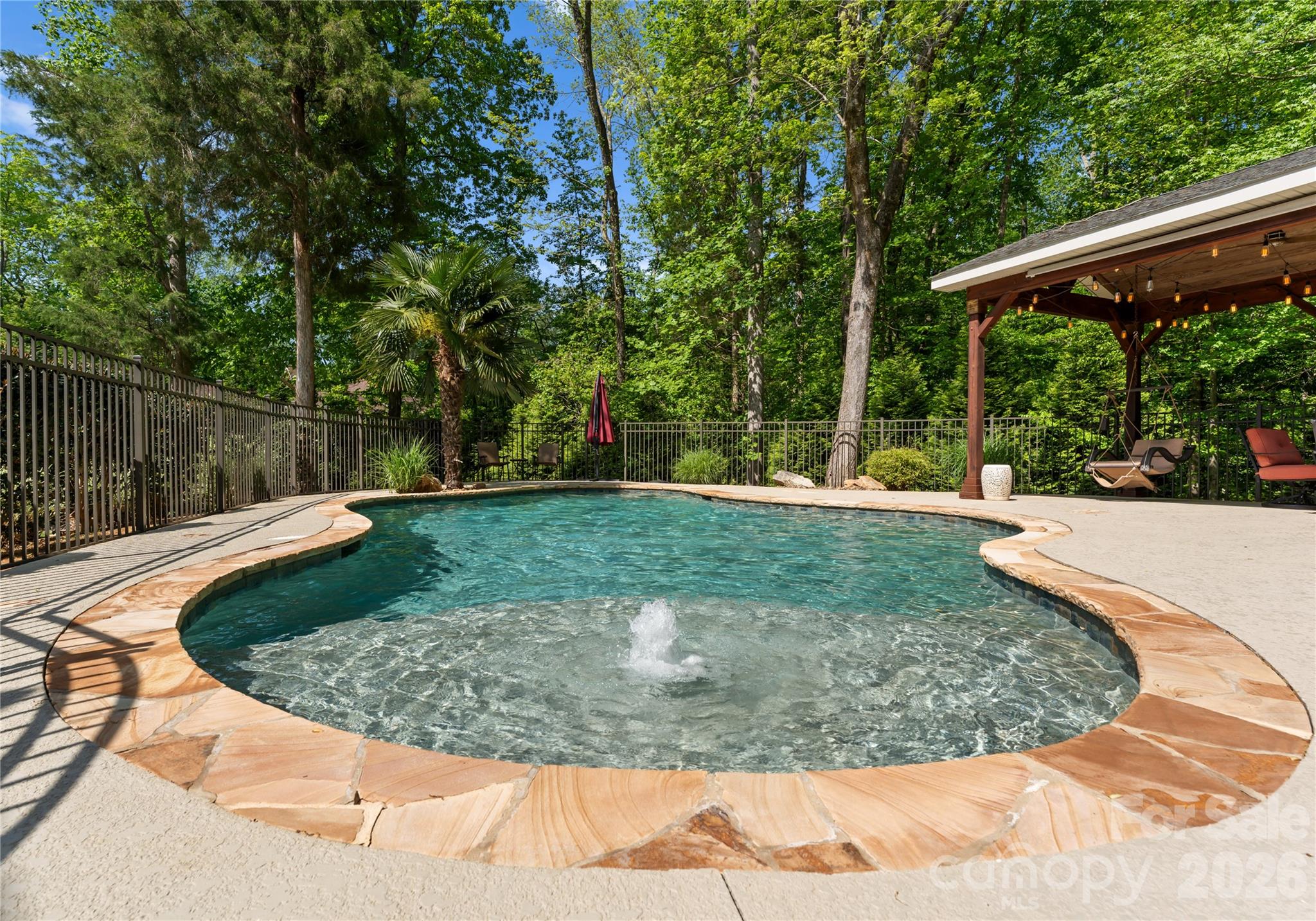 860 Arrow Point Lane Kannapolis, NC 28081 - Photo 29 of 38 a view of a backyard with large trees