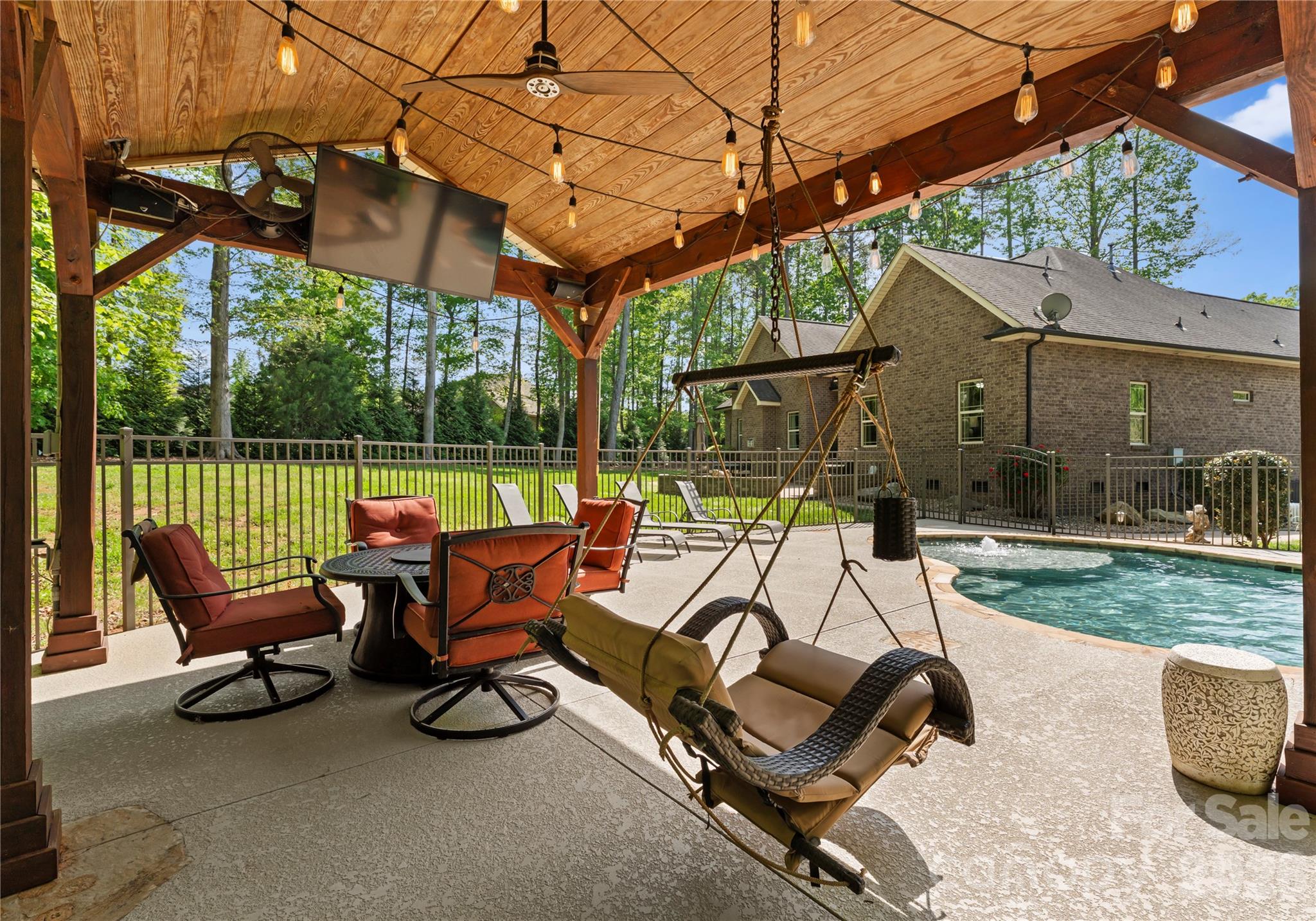 860 Arrow Point Lane Kannapolis, NC 28081 - Photo 32 of 38 a view of a patio with a table chairs and a backyard