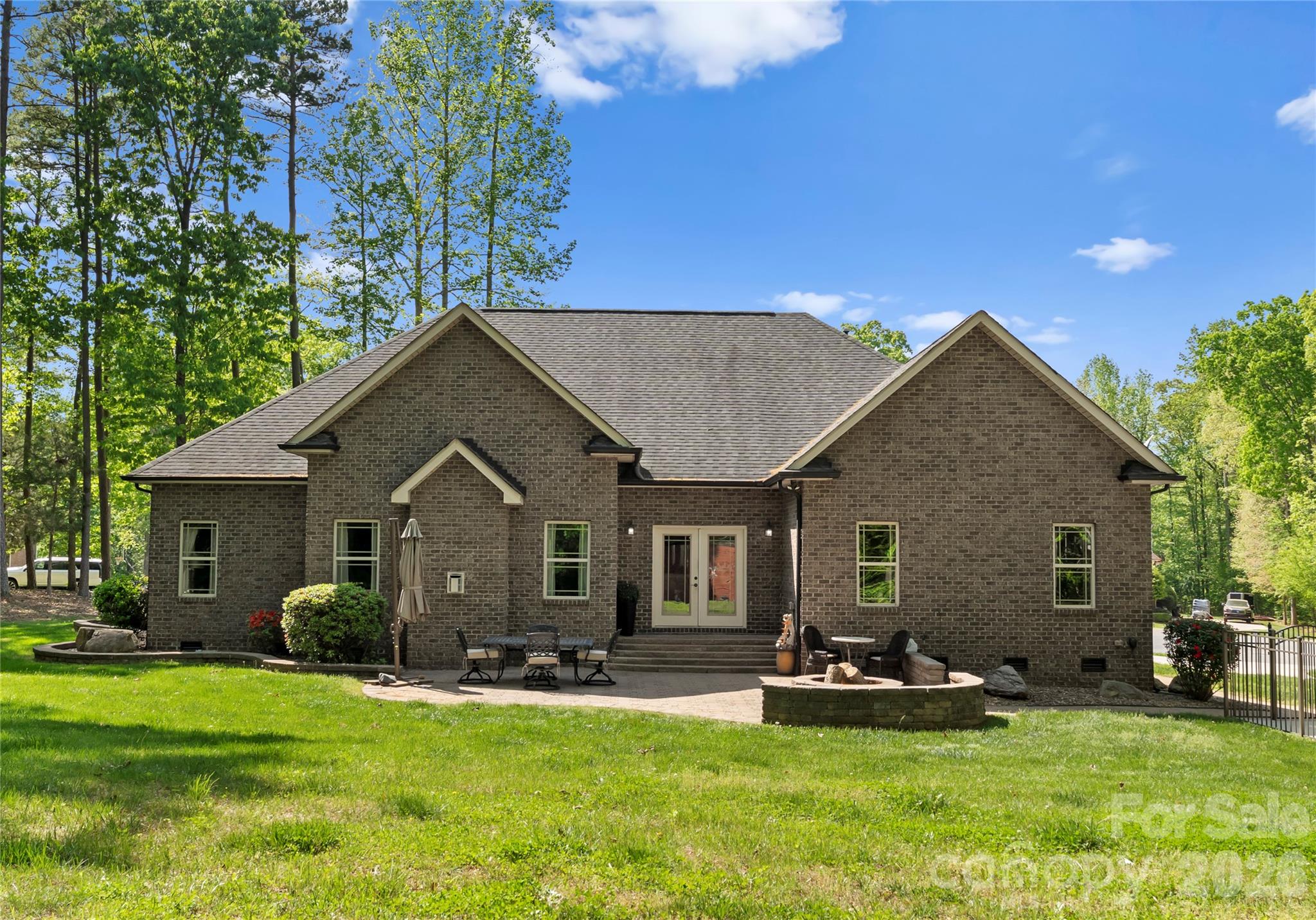 860 Arrow Point Lane Kannapolis, NC 28081 - Photo 34 of 38 a view of a house with backyard and sitting area