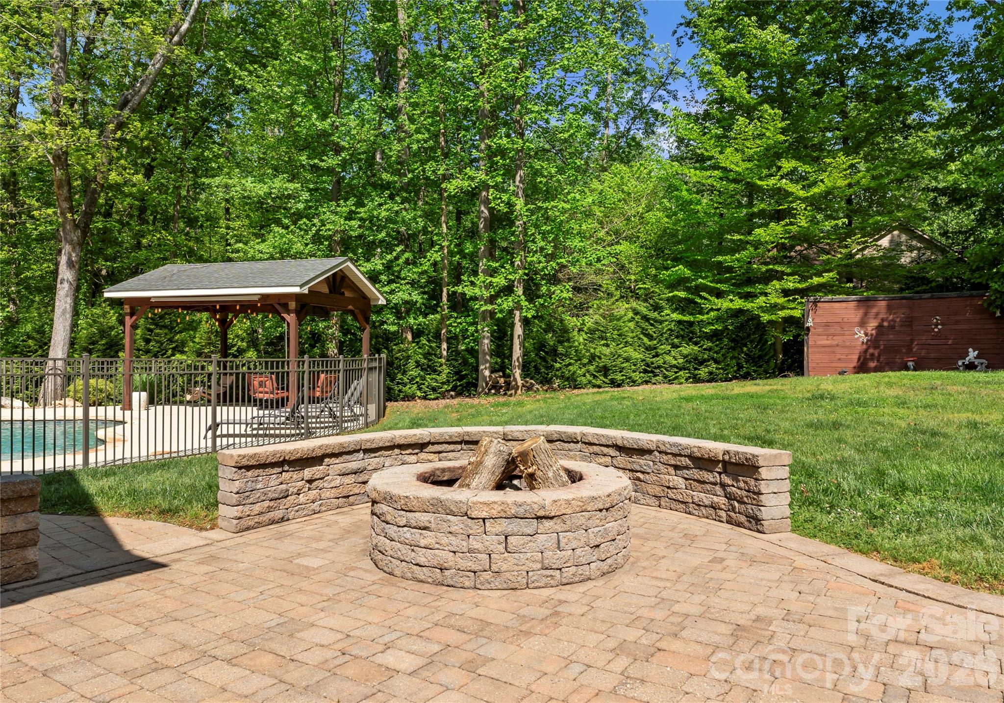 860 Arrow Point Lane Kannapolis, NC 28081 - Photo 35 of 38 a view of a backyard with sitting area and furniture