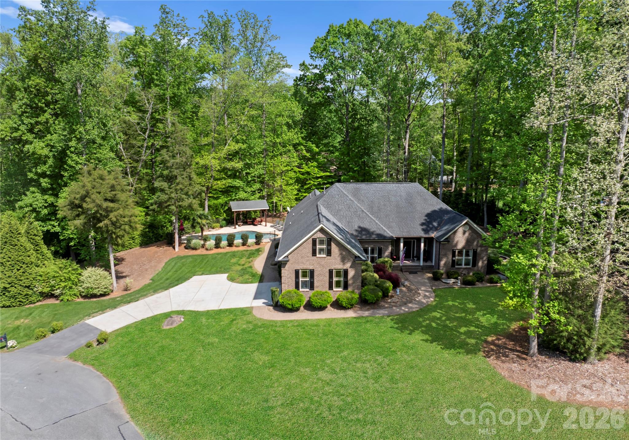 860 Arrow Point Lane Kannapolis, NC 28081 - Photo 4 of 38 a view of a house with a big yard plants and large trees