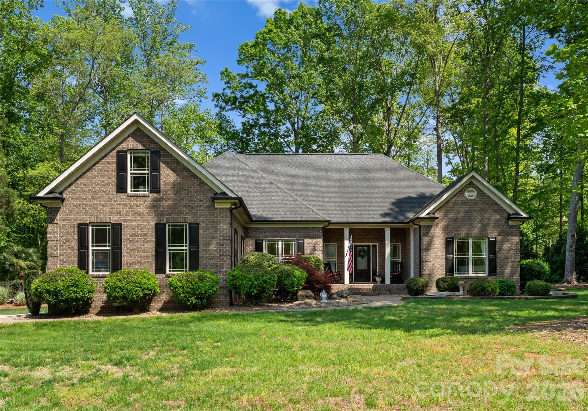 860 Arrow Point Lane Kannapolis, NC 28081 - Photo 5 of 38 a front view of a house with a yard porch and outdoor seating