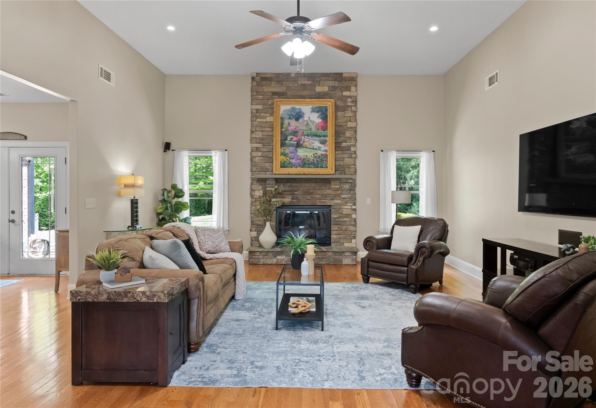 860 Arrow Point Lane Kannapolis, NC 28081 - Photo 10 of 38 a living room with furniture fireplace and flat screen tv