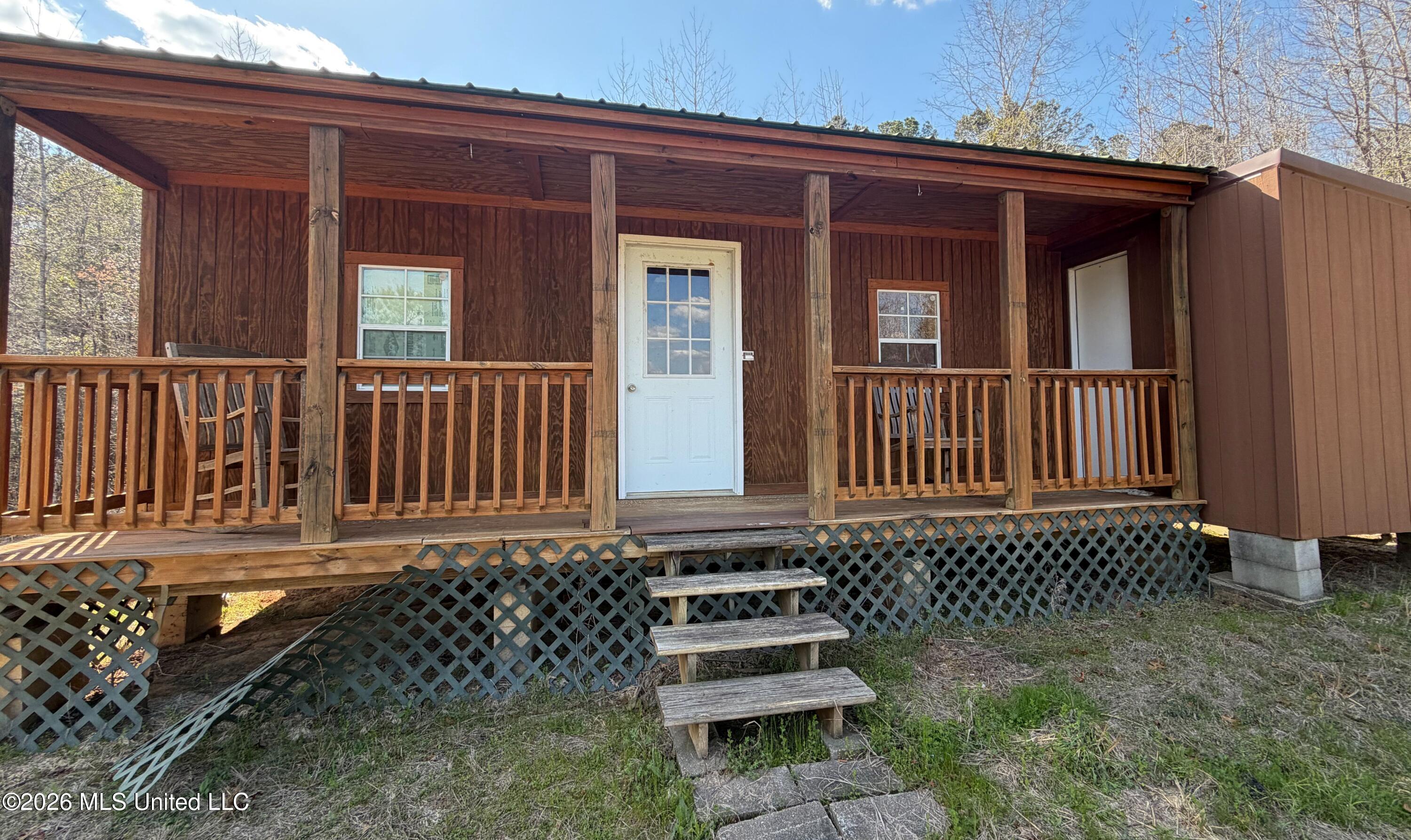 Cabin Overlooking Field