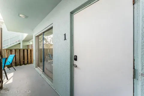 a view of hallway with furniture