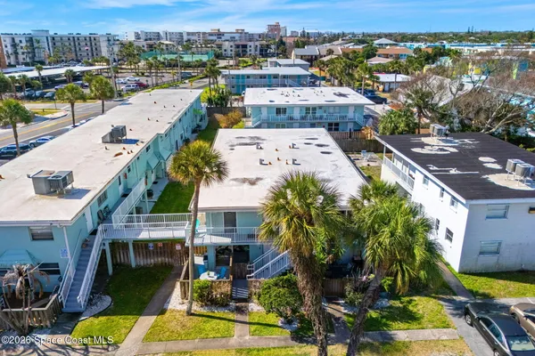 an aerial view of residential building with outdoor space