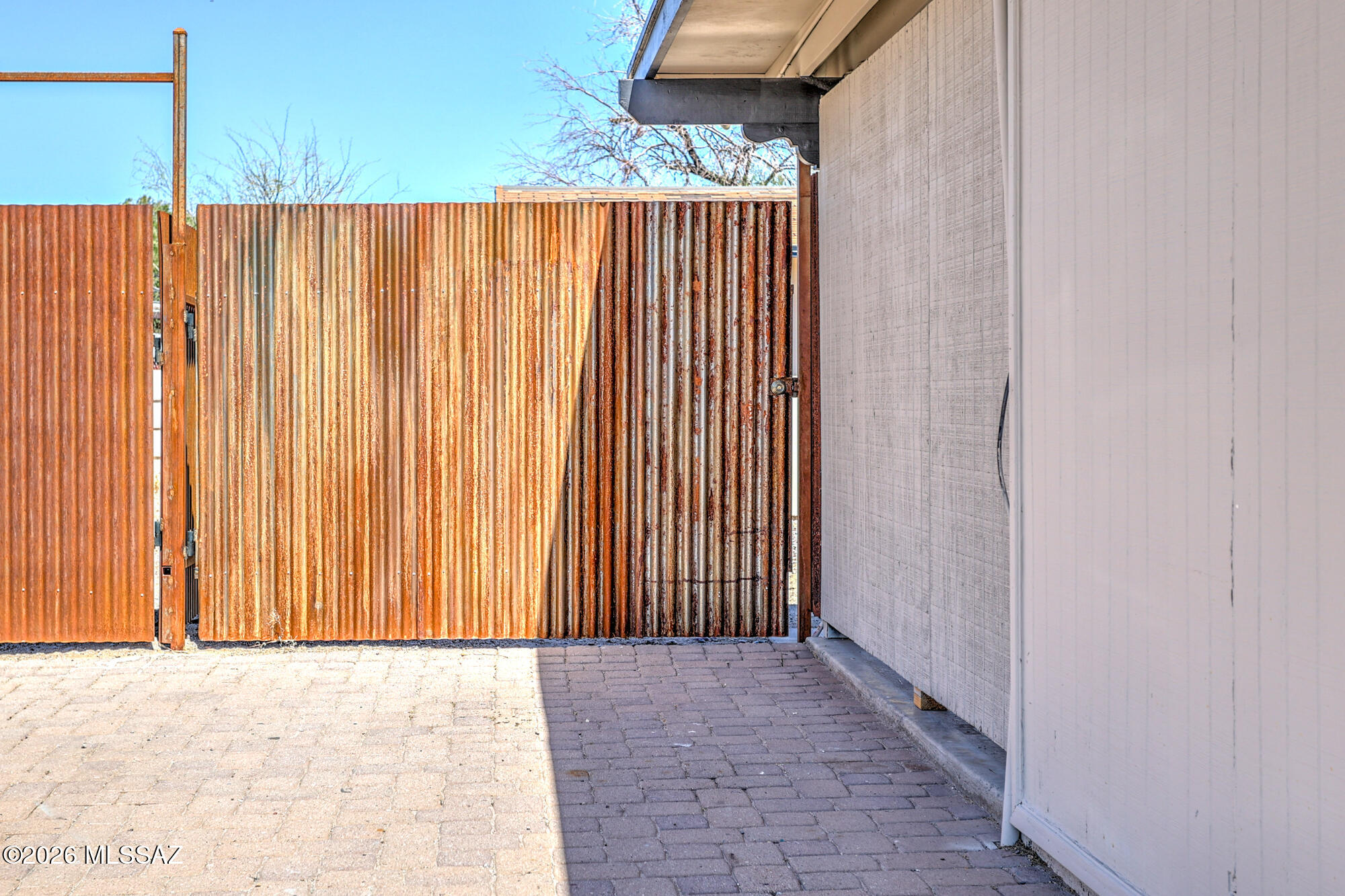 4400 West Ina Road Tucson, AZ 85741 - Photo 13 of 43 a view of a wooden fence