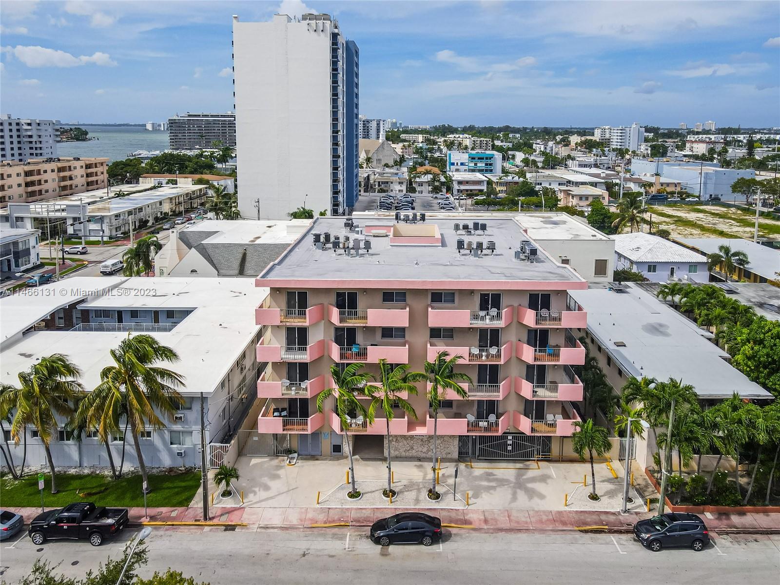 6920 Harding Avenue, Unit 502 Miami Beach, FL 33141 - Photo 11 of 39 a front view of a building with street view
