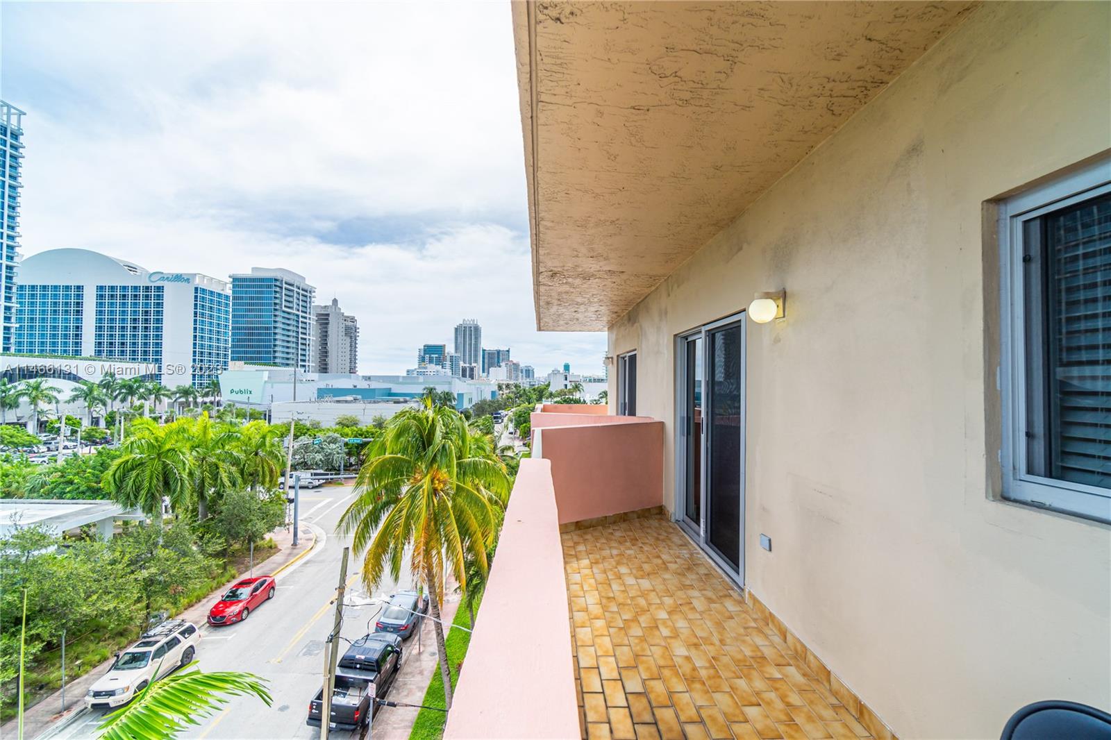 6920 Harding Avenue, Unit 502 Miami Beach, FL 33141 - Photo 12 of 39 a view of a balcony with plants