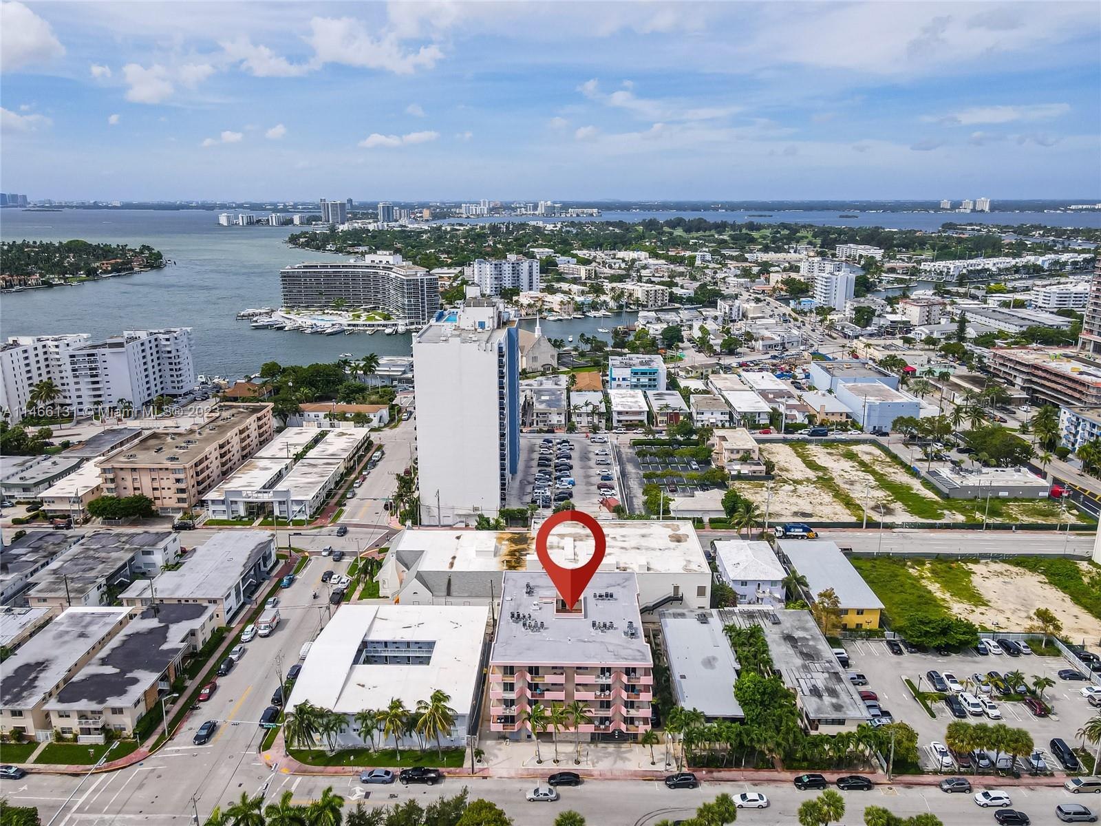 6920 Harding Avenue, Unit 502 Miami Beach, FL 33141 - Photo 16 of 39 an aerial view of residential building and lake