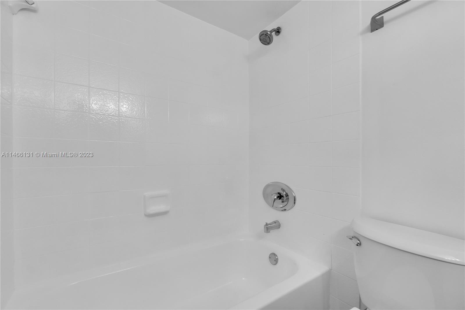 6920 Harding Avenue, Unit 502 Miami Beach, FL 33141 - Photo 30 of 39 a bathroom with a bathtub