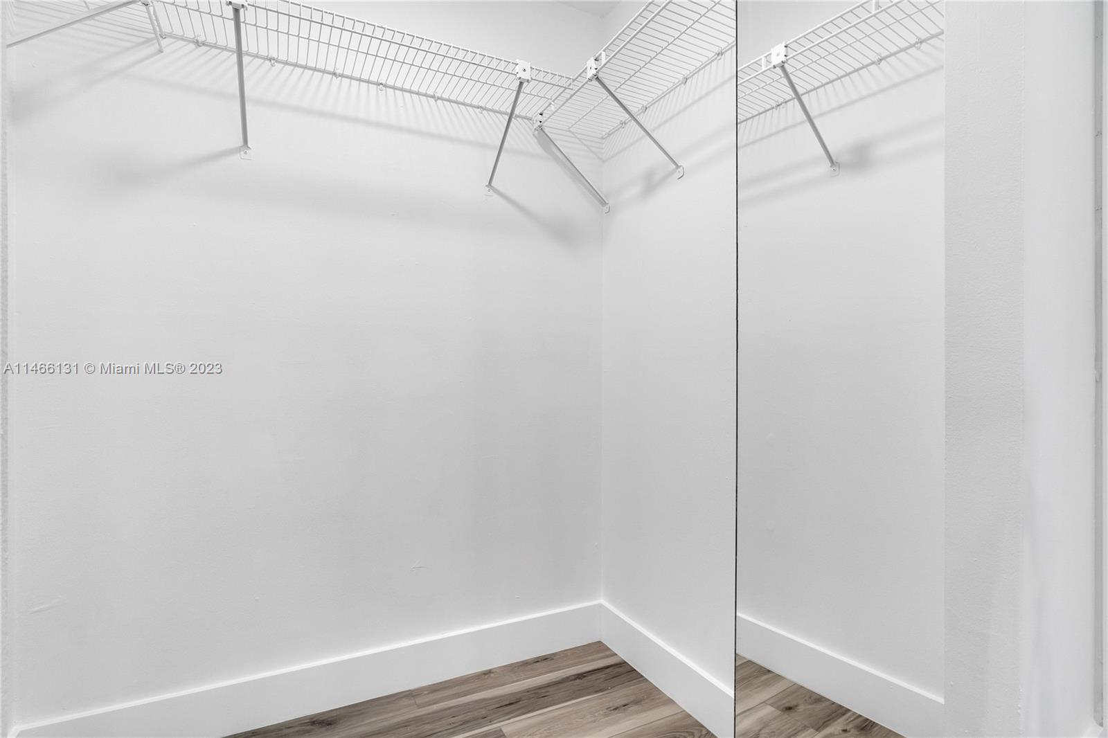 6920 Harding Avenue, Unit 502 Miami Beach, FL 33141 - Photo 33 of 39 a view of small space with racks on the wall