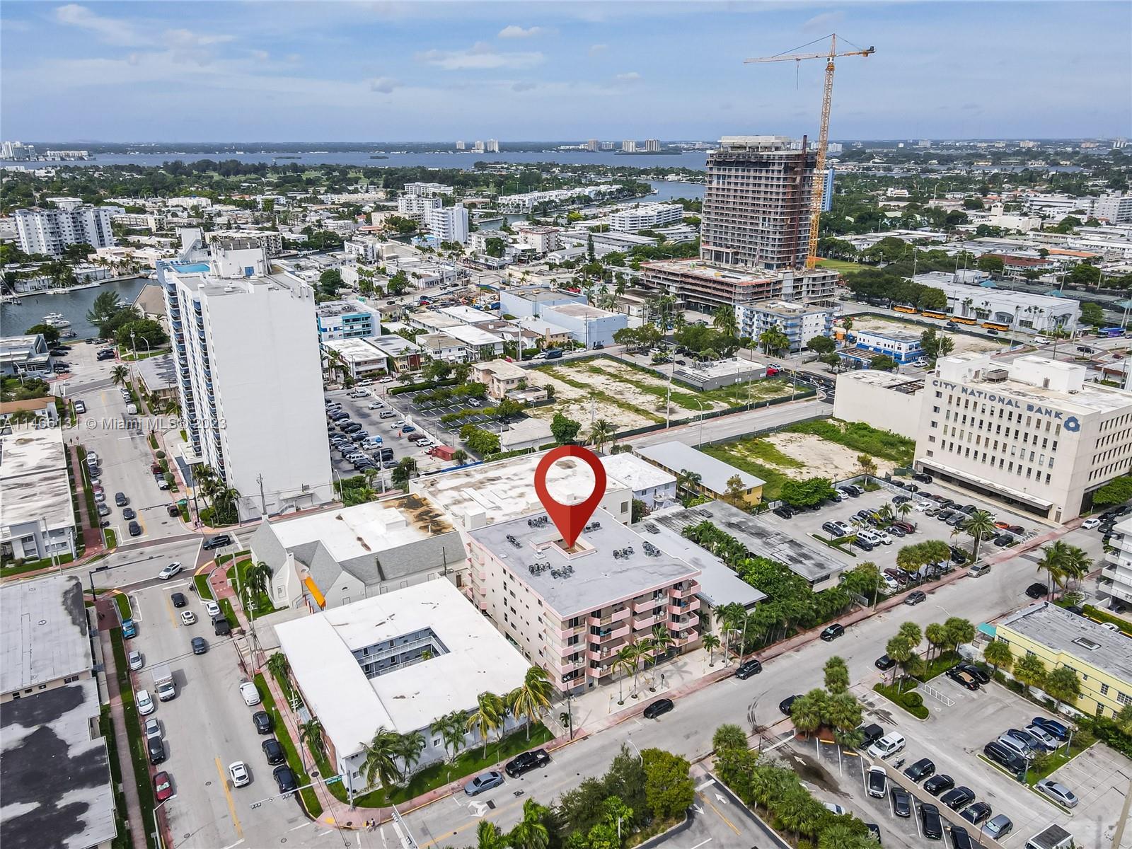 6920 Harding Avenue, Unit 502 Miami Beach, FL 33141 - Photo 4 of 39 an aerial view of a city with lawn chairs