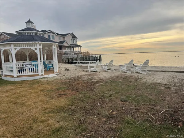 a view of a house with a ocean view