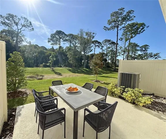 a view of a playground with a garden