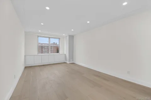 a picture of a room with a white wall and sign