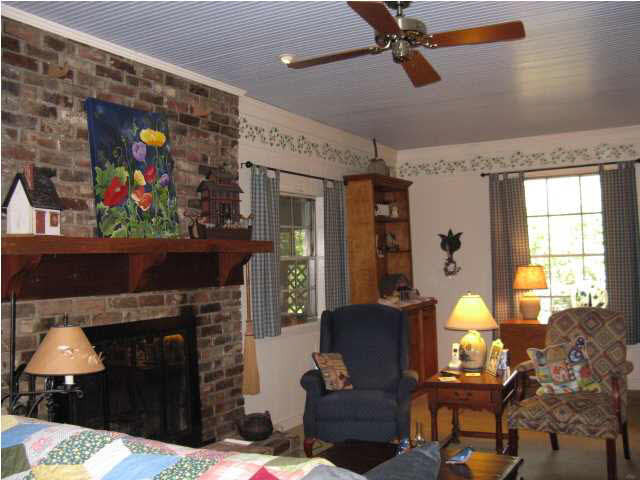 5475 Ridgewood Road Jackson, MS 39211 - Photo 11 of 27 Sunroom or second den with fireplace.