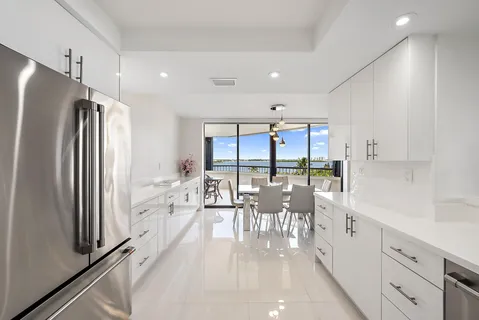 a very nice looking dining room with a large window