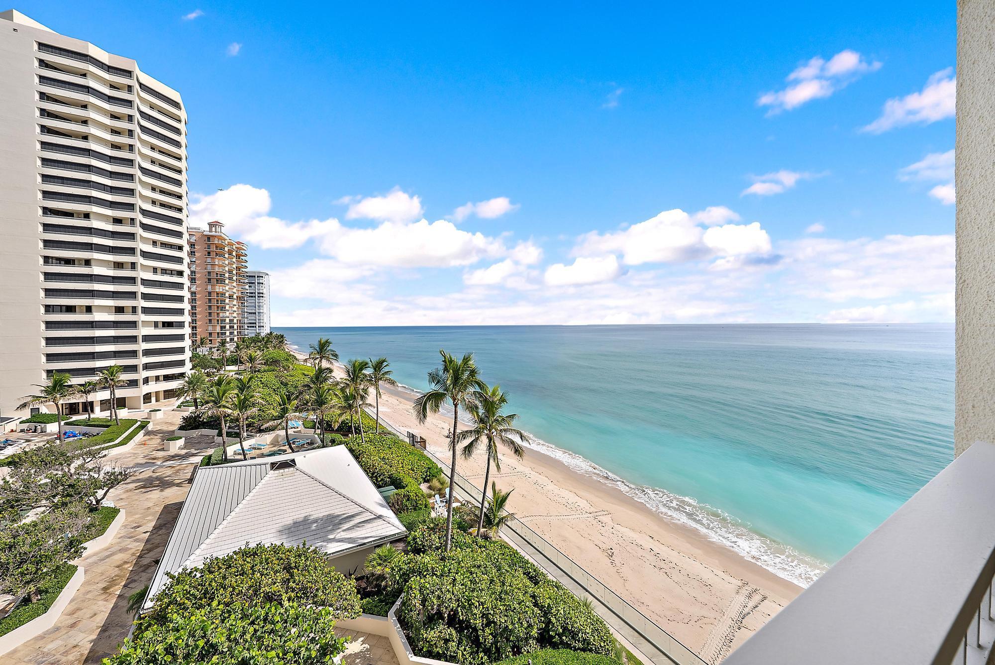 5070 North Ocean Drive, Unit 5B Riviera Beach, FL 33404 - Photo 2 of 37 a view of a lake with a outdoor space
