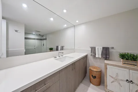 a view of storage and utility room with washer and dryer