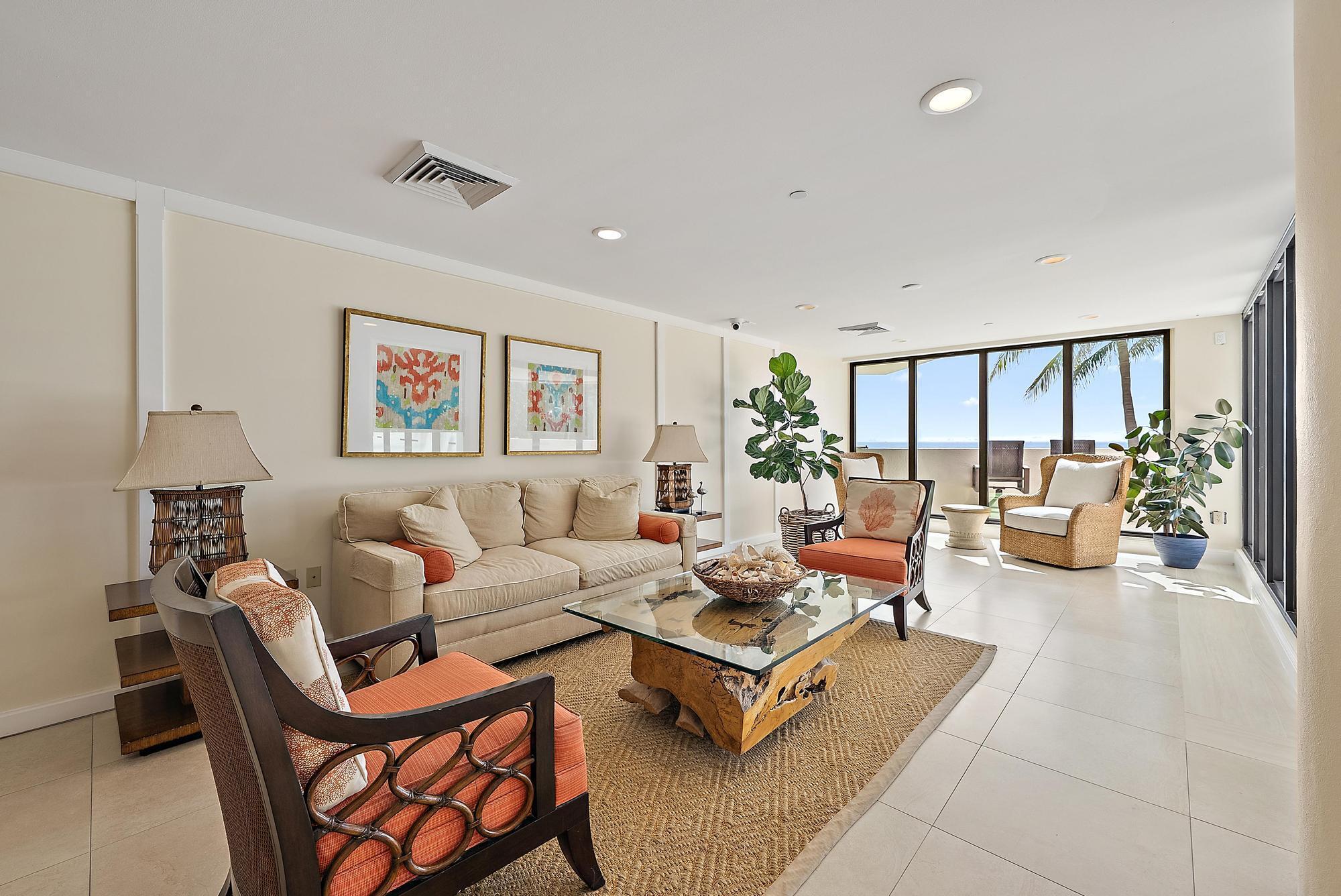 5070 North Ocean Drive, Unit 5B Riviera Beach, FL 33404 - Photo 27 of 37 a living room with furniture and a large window