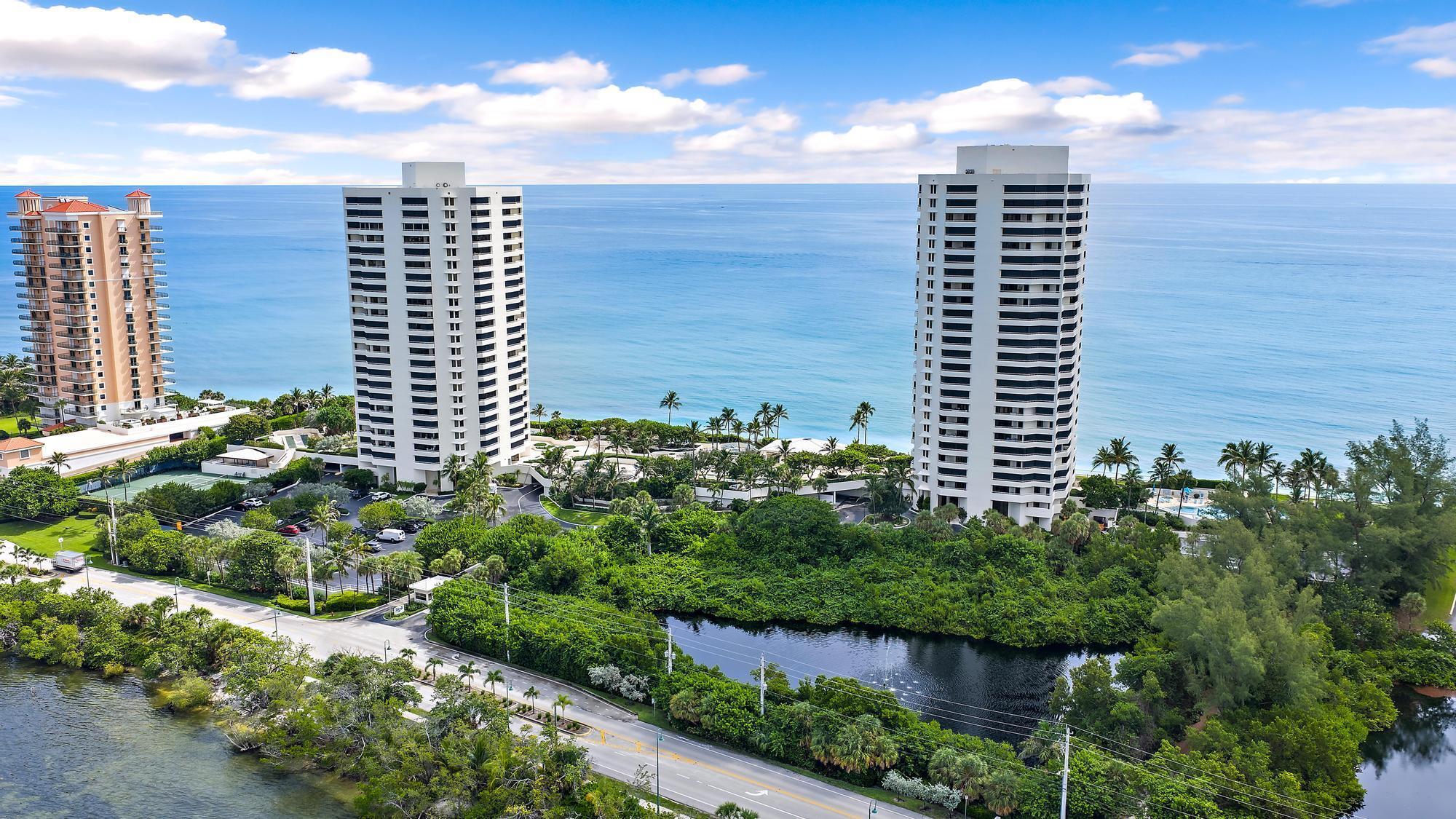 5070 North Ocean Drive, Unit 5B Riviera Beach, FL 33404 - Photo 36 of 37 a view of a city with tall buildings