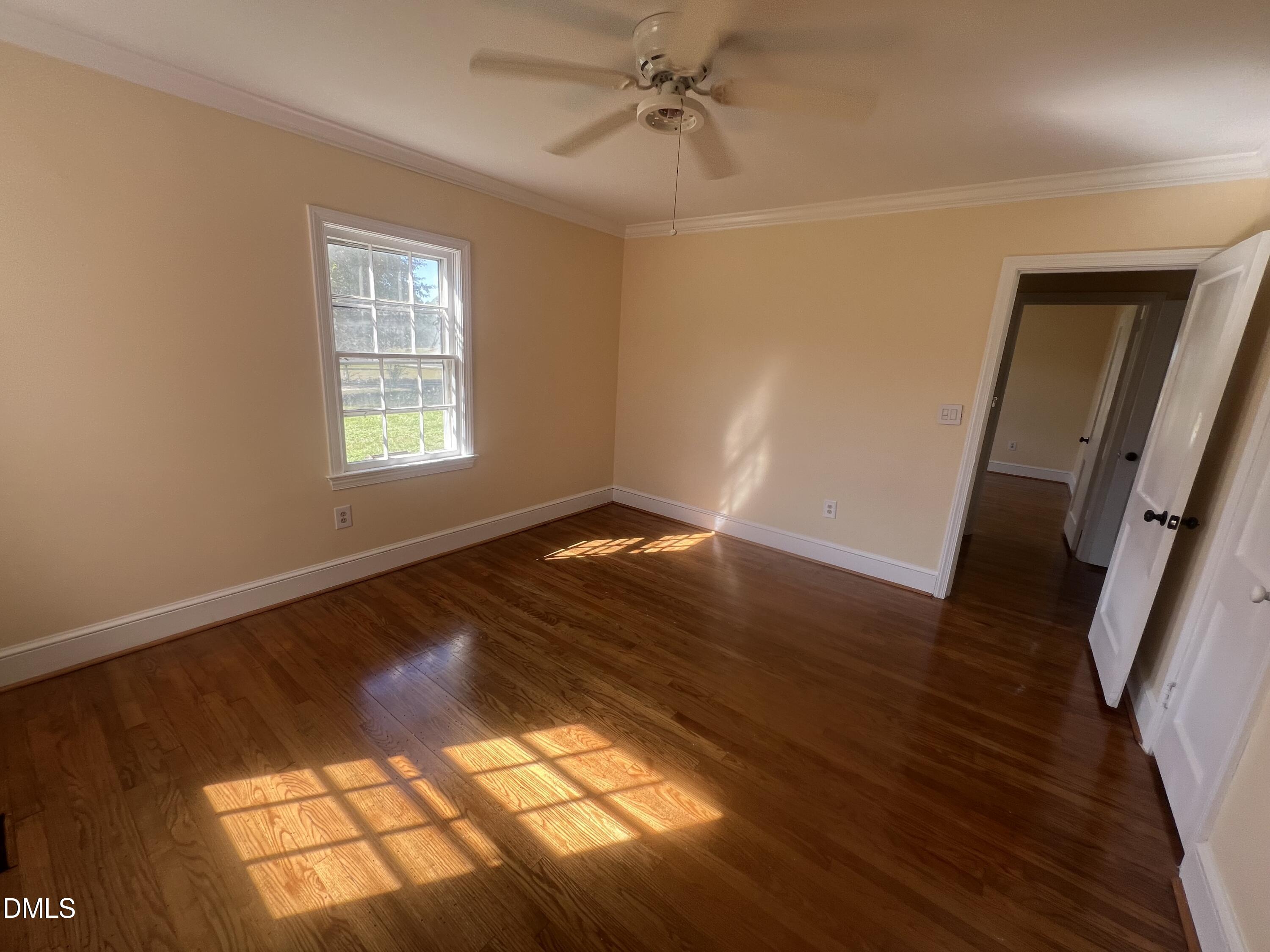 122 Bill Avery Road Coats, NC 27521 - Photo 21 of 51 a view of an empty room and window