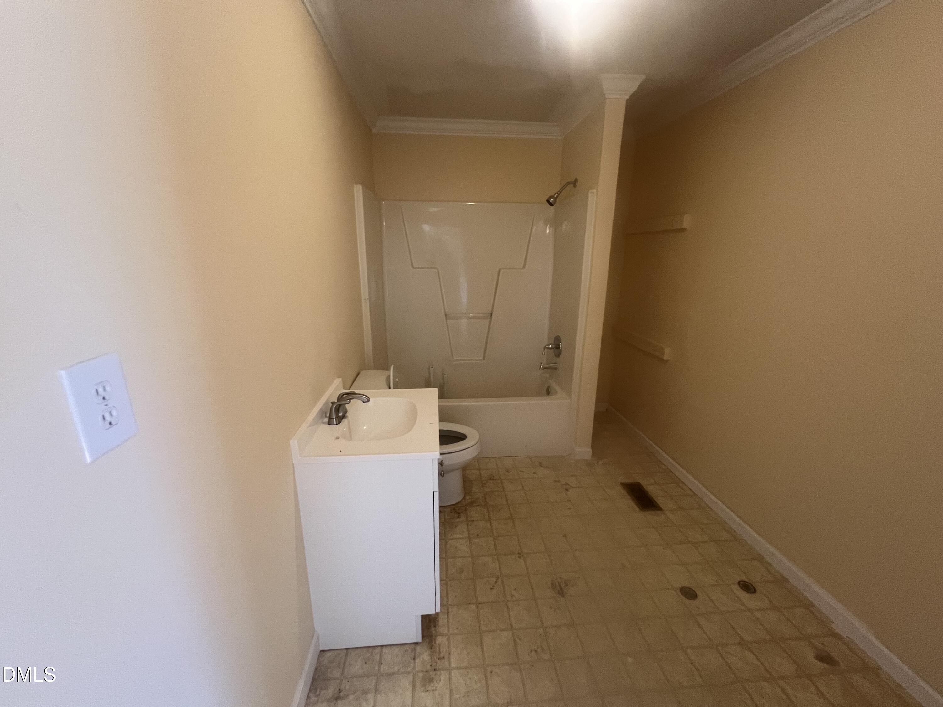 122 Bill Avery Road Coats, NC 27521 - Photo 22 of 51 a bathroom with a sink and mirror with bathtub