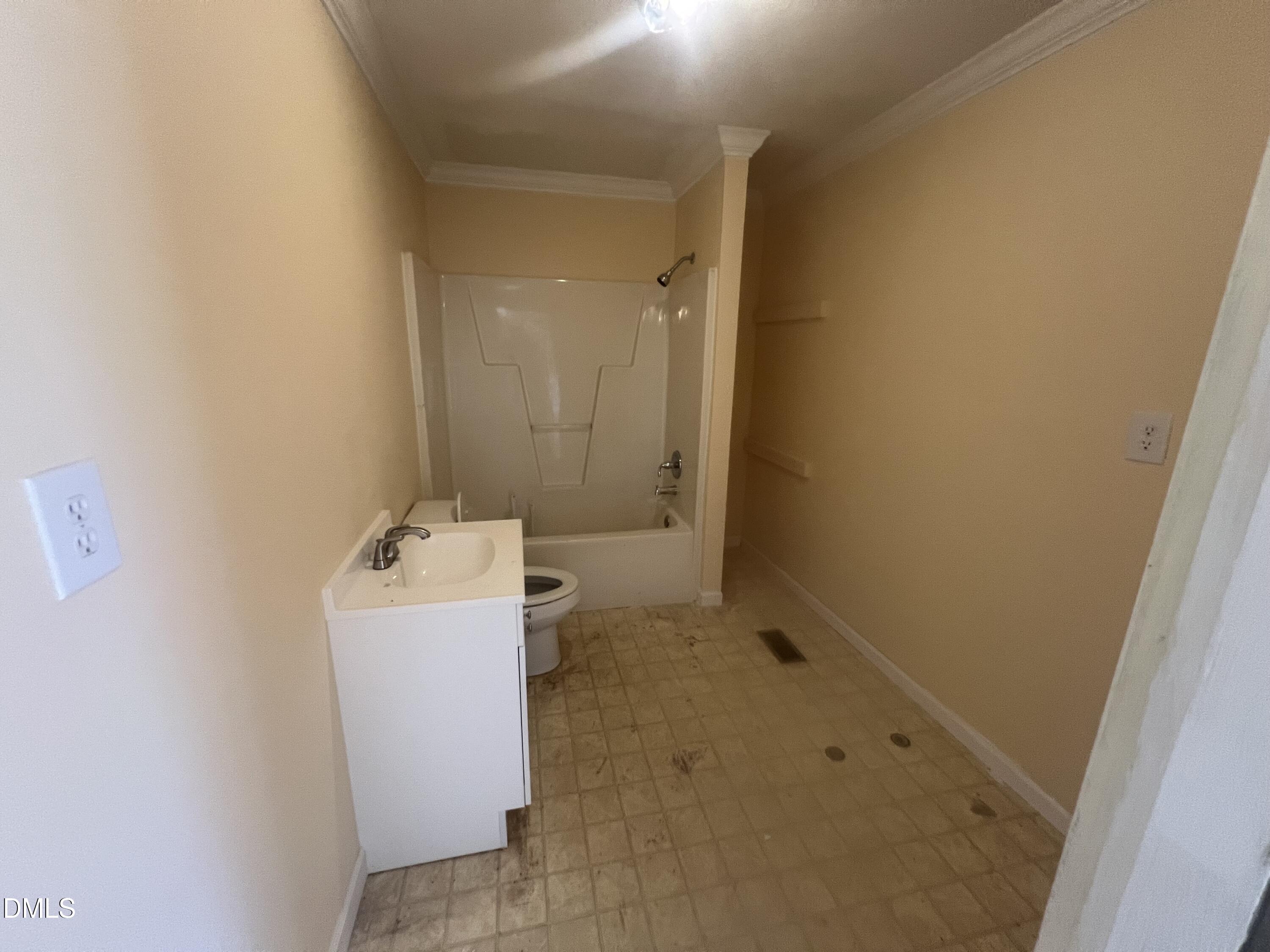 122 Bill Avery Road Coats, NC 27521 - Photo 23 of 51 a bathroom with a sink and mirror