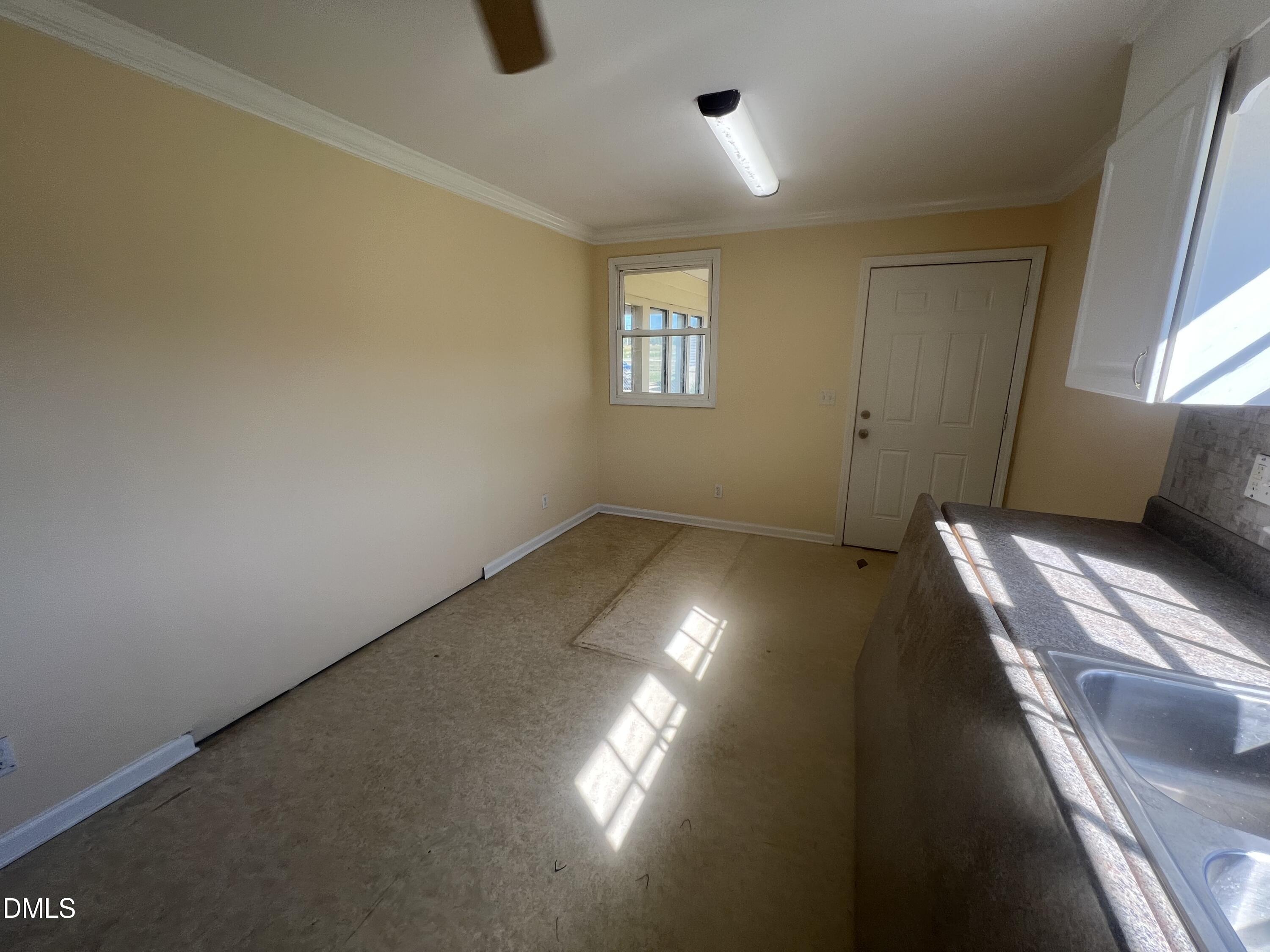 122 Bill Avery Road Coats, NC 27521 - Photo 30 of 51 an empty room with windows