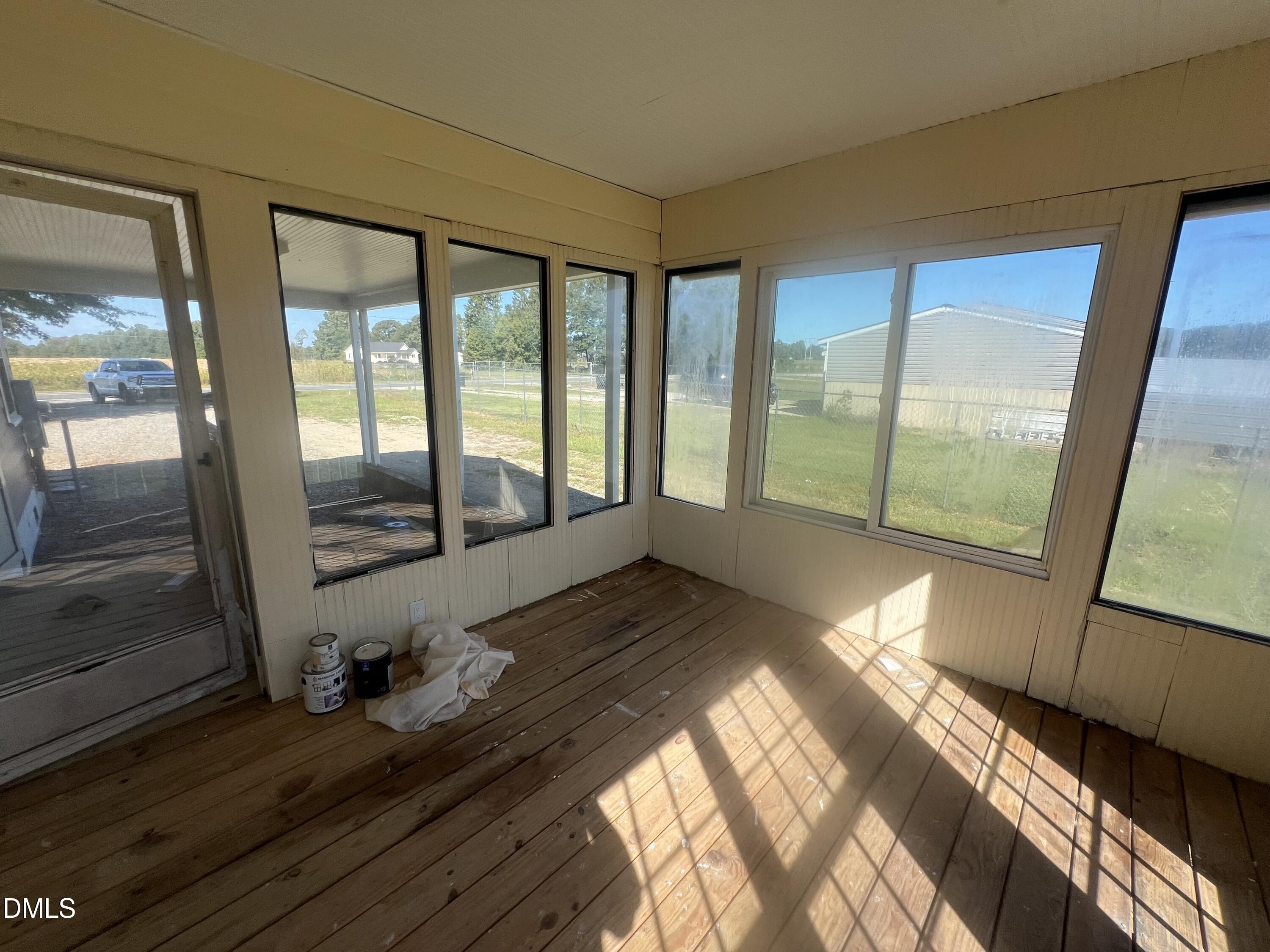 122 Bill Avery Road Coats, NC 27521 - Photo 33 of 51 a view of a room with a balcony wooden floor