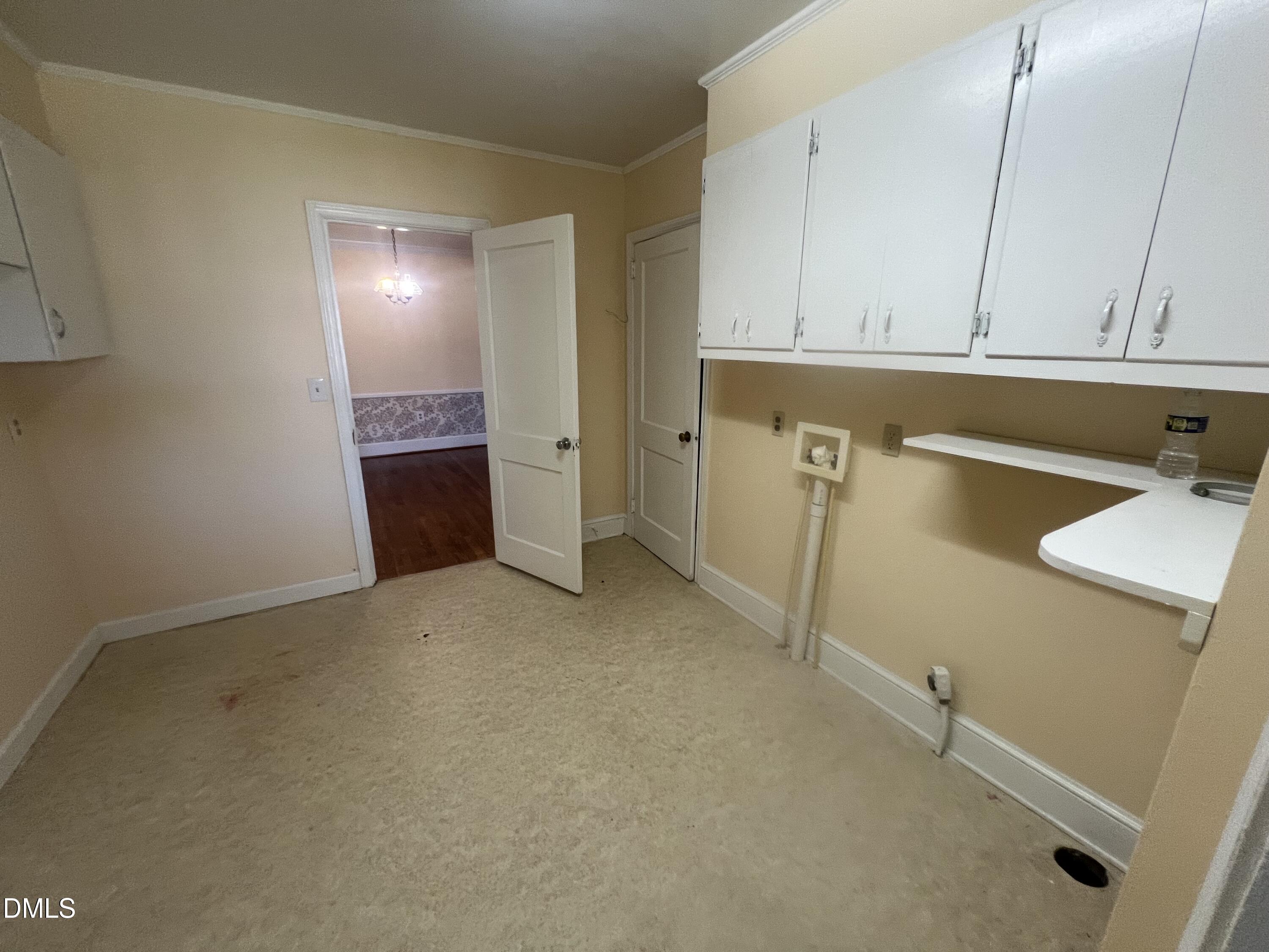 122 Bill Avery Road Coats, NC 27521 - Photo 37 of 51 a view of kitchen and utility room