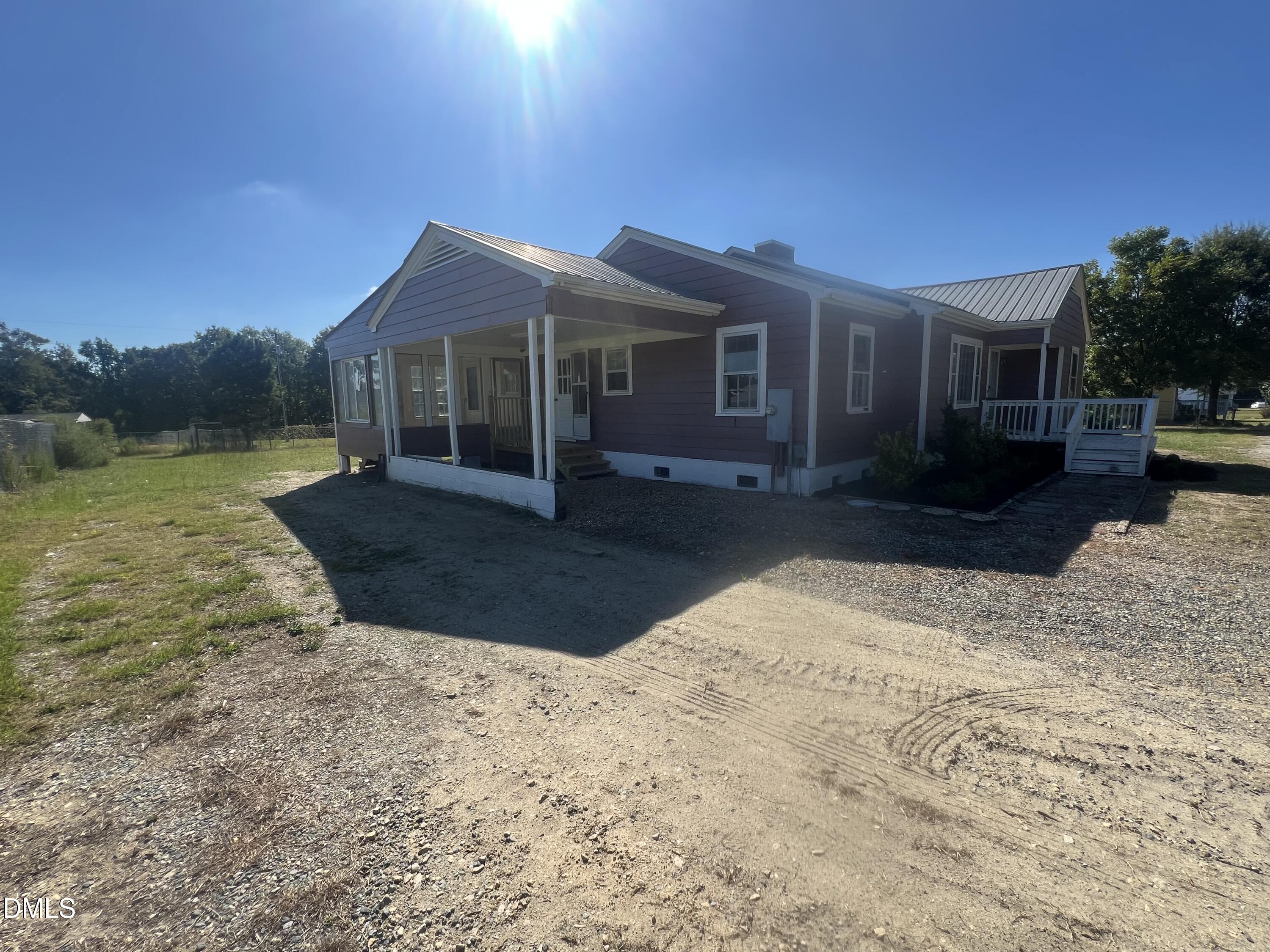 122 Bill Avery Road Coats, NC 27521 - Photo 7 of 51 a front view of a house with a yard