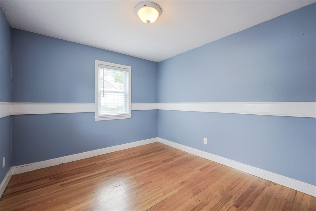 20 Kent Street Saugus, MA 01906 - Photo 15 of 41 a view of a room with wooden floor and windows