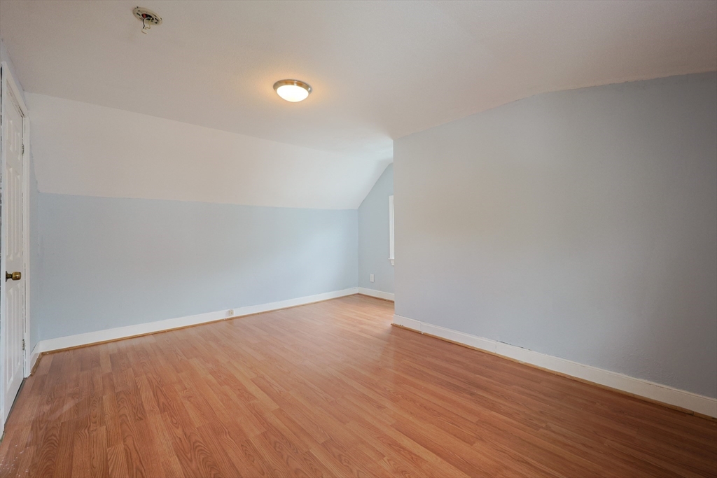 20 Kent Street Saugus, MA 01906 - Photo 28 of 41 a view of an empty room with wooden floor